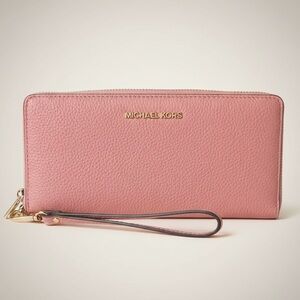 Michael Kors Pink Pebbled Leather Long Wristlet/Wallet with gold hardware. NWOT